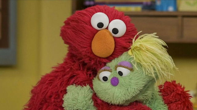 Elmo hugging Karli