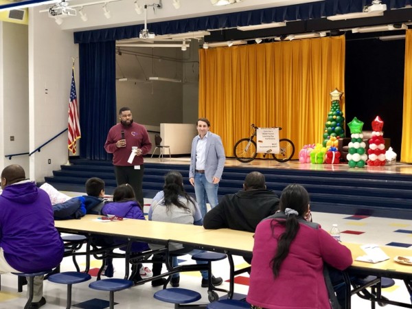 Picture of Roberts Paideia Principal Alpacino Beauchamp and Roberts Welcome Center Director Antonio Fernandez address the parents at the beginning of the conference.