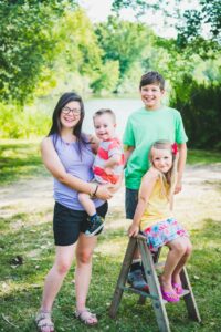 a mother with three children, one with down syndrome