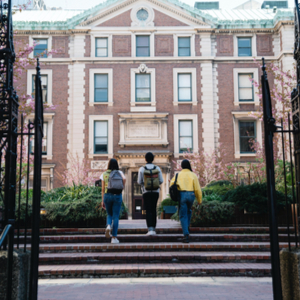 Students walking up to school building.
