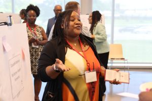 Parent leader Cassandra presents her plan to other parent leaders and state education representatives at the Family Leaders for Ohio Schools Academy celebration at Ohio State