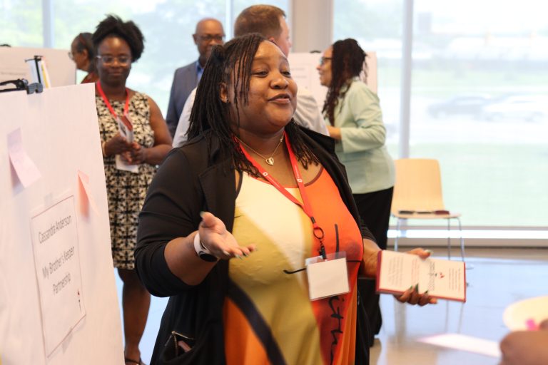 Parent leader Cassandra presents her plan to other parent leaders and state education representatives at the Family Leaders for Ohio Schools Academy celebration at Ohio State
