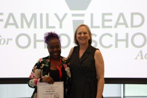 Ohio parent Demetra receiving a certificate of completion for the Family Leaders for Ohio Schools Academy in Spring 2026 from Dr. Barbara Boone